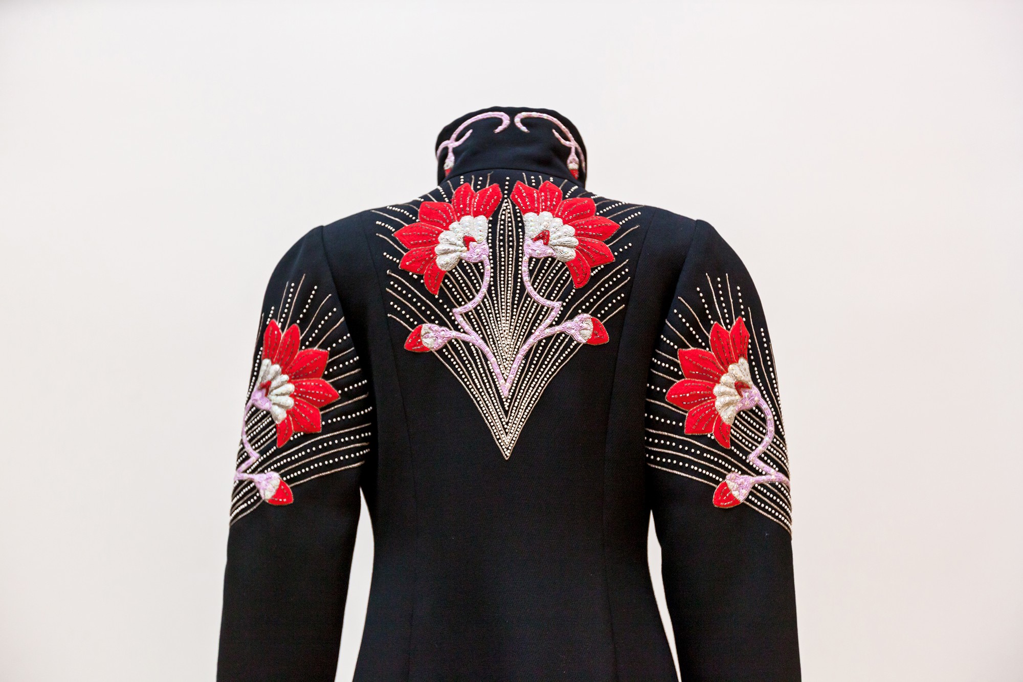 Large editorial shot of embroidered jacket on mannequin
